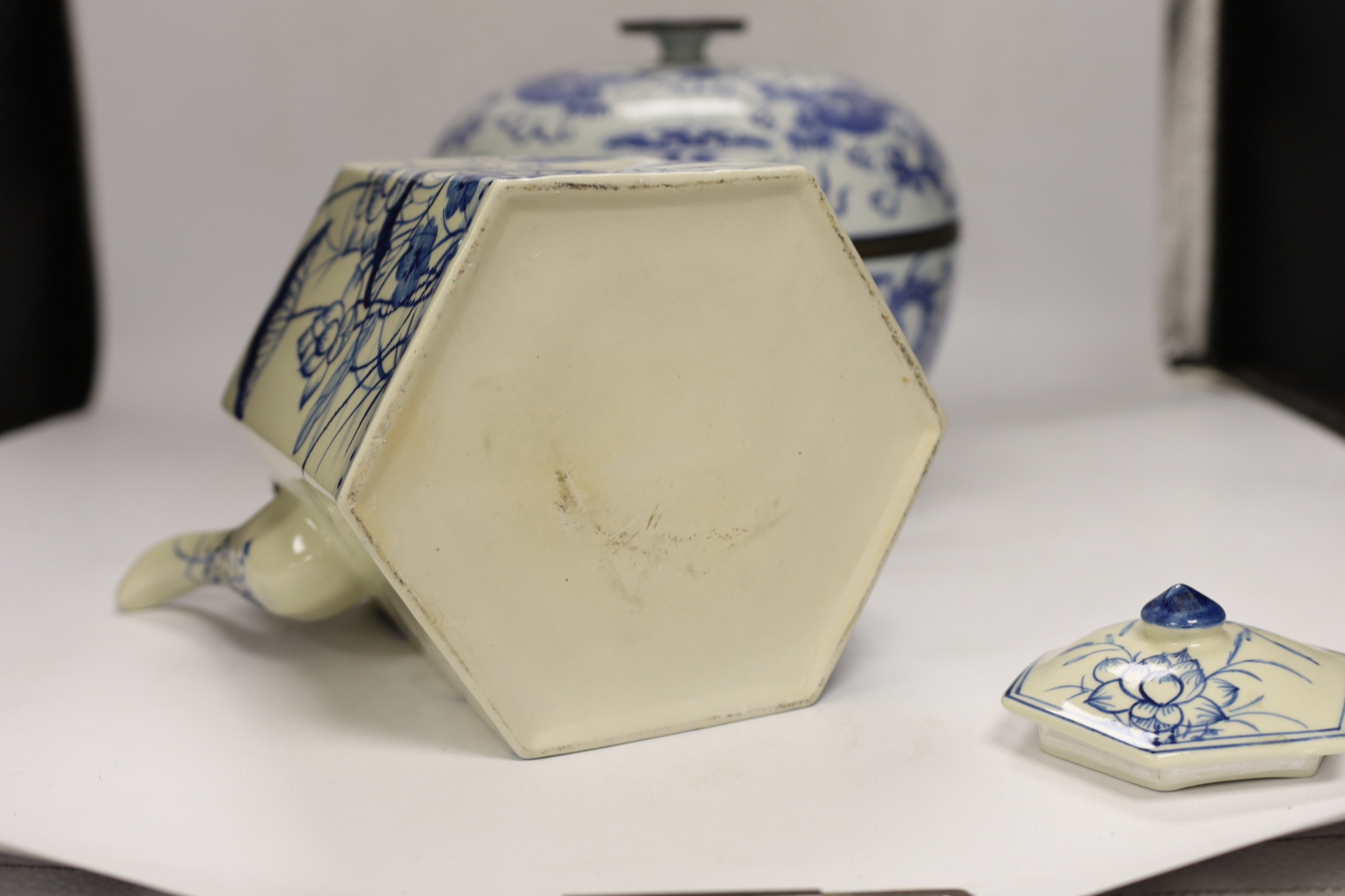 Four modern Chinese blue and white ceramic items; two teapots, a lidded vessel and a bowl, tallest 23.5cm